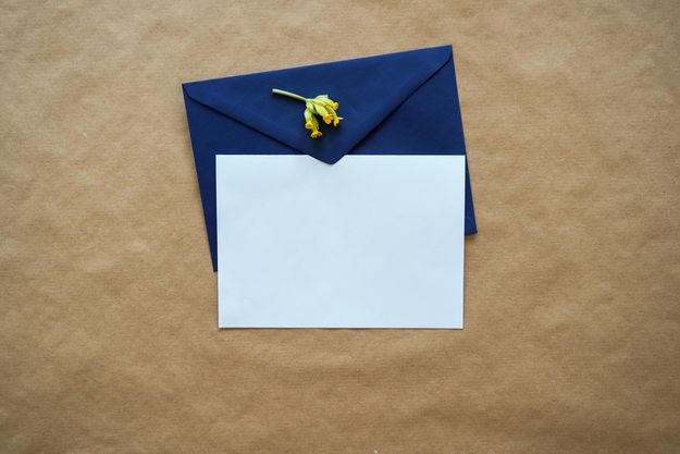 invitation card with blue envelope