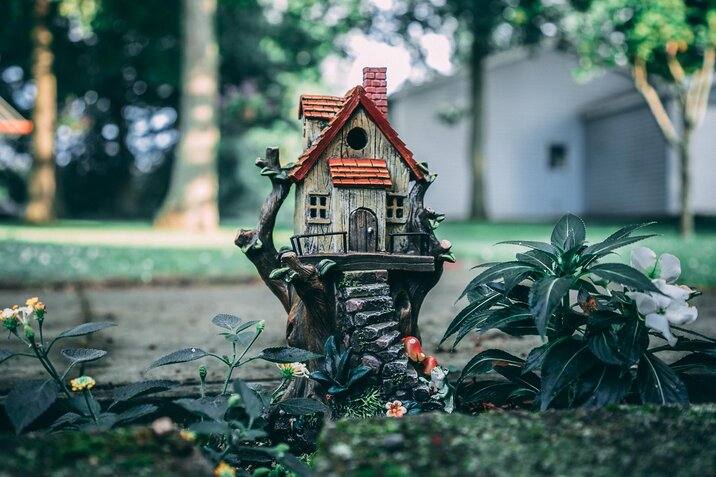 green-birdhouse-garden-figurine