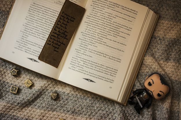 Leather bookmark in a book