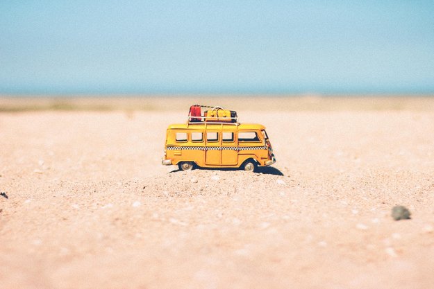 Yellow bus on the beach