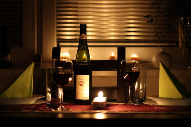 Candlelight dinner with wine