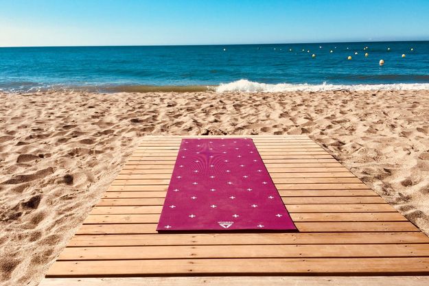 yoga mat on a beach