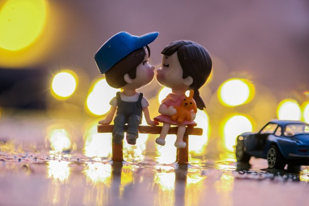 Cute figurines of boy and girl