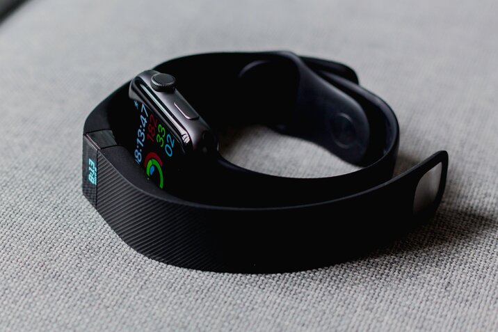 two black fitness trackers