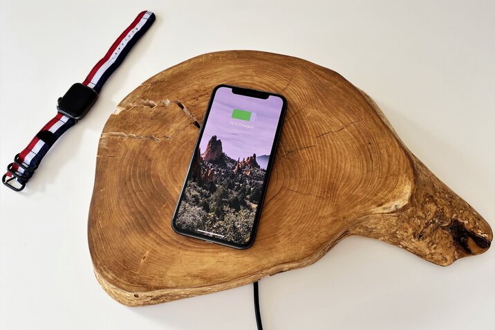 Wooden portable charger with blue wires